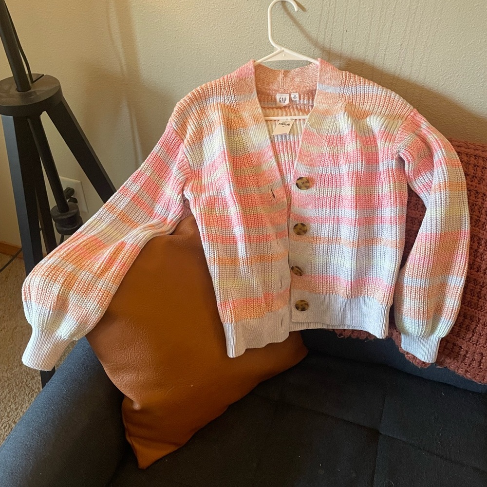 NEVEE WORN, lightly colored, knitted button up sweater.